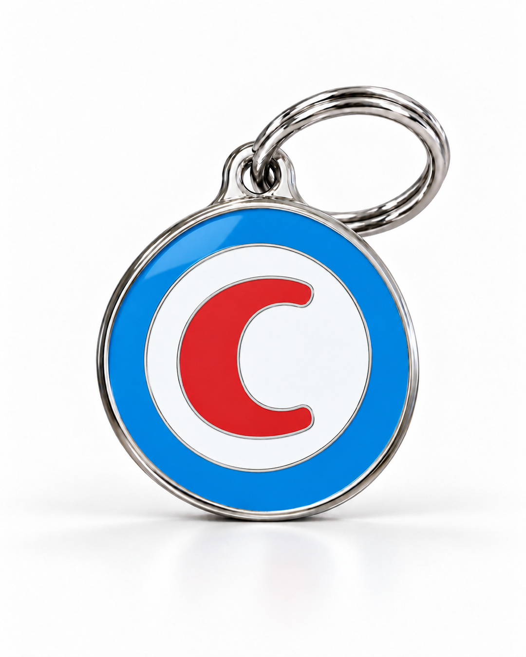 TAGiDOG letter C dog ID tag, round front view on white