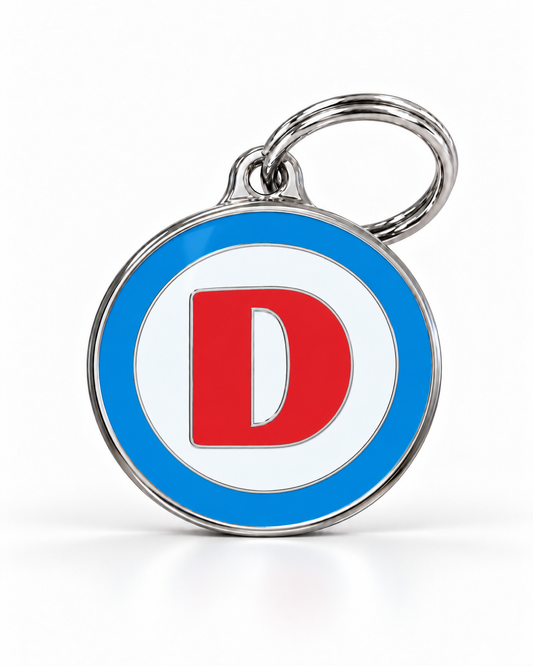 TAGiDOG letter D dog ID tag, round front view on white