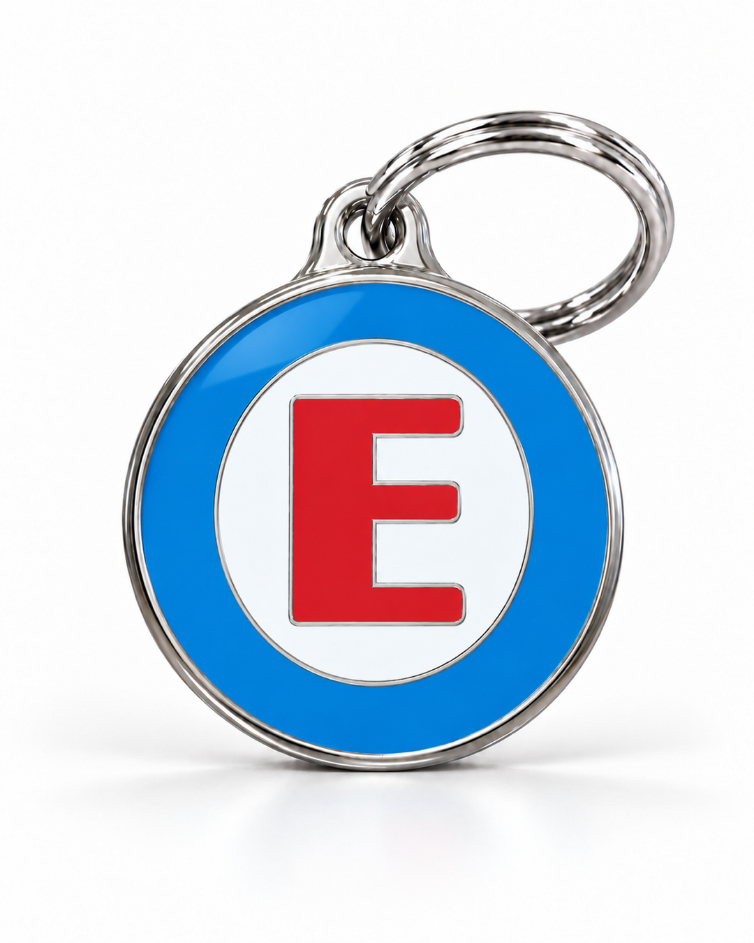 TAGiDOG letter E dog ID tag, round front view on white