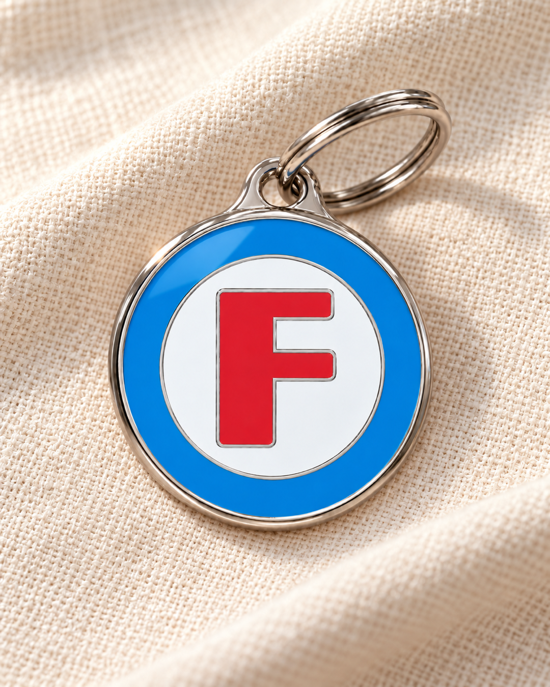 TAGiDOG letter F dog ID tag on light linen