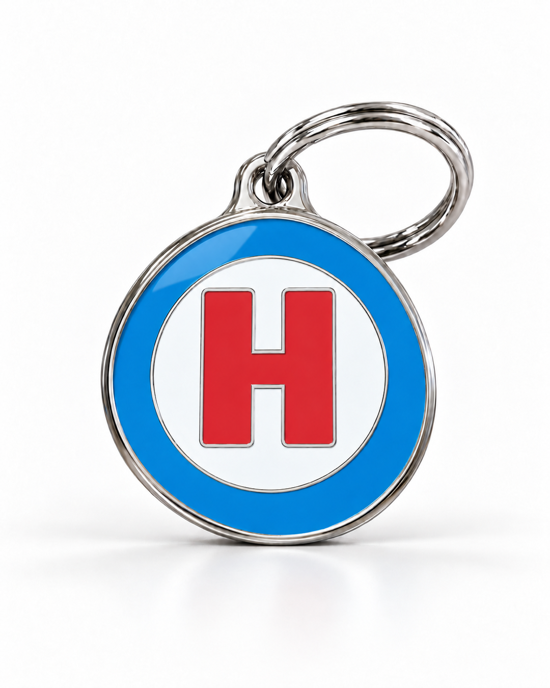 TAGiDOG letter H dog ID tag, round front view on white
