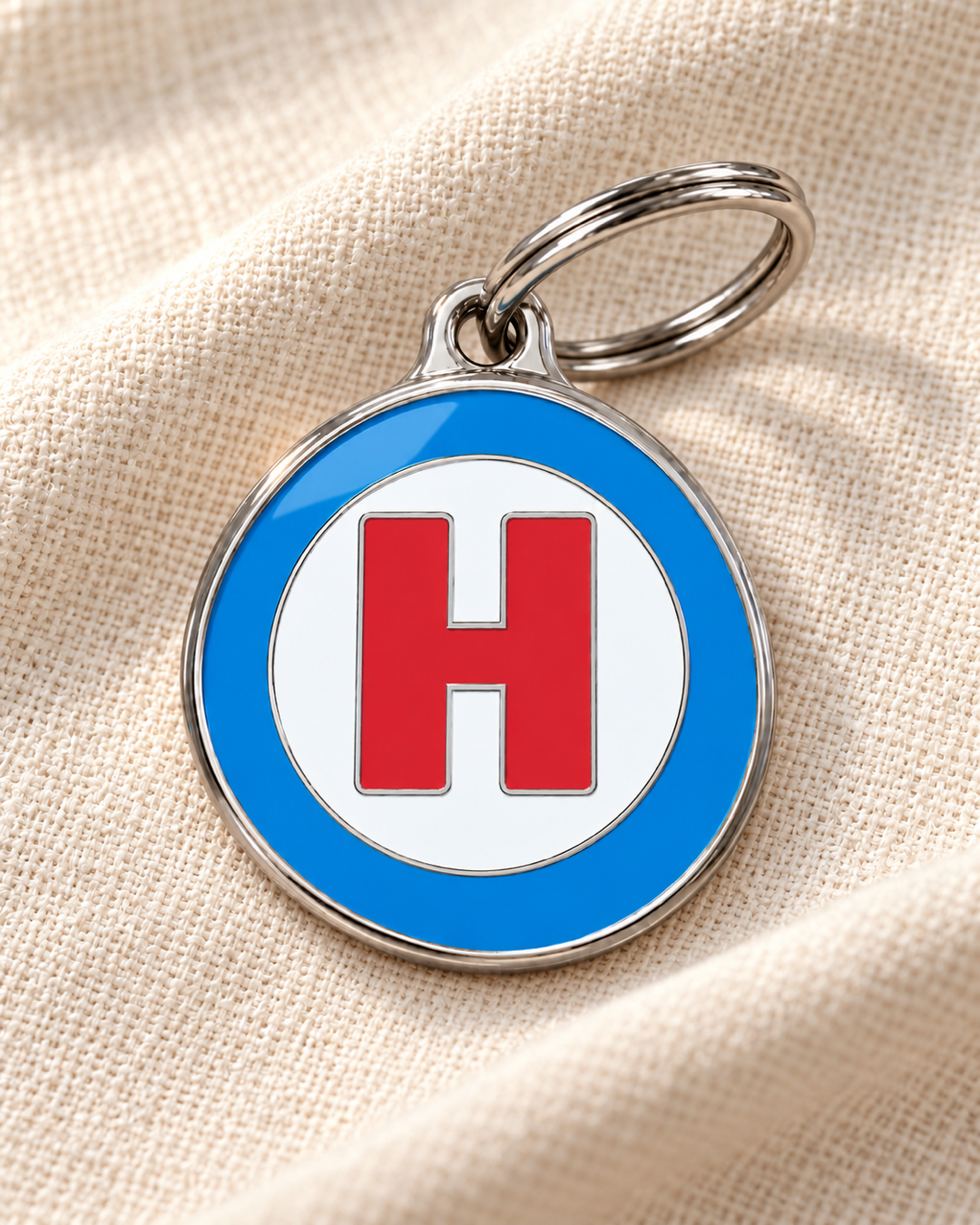 TAGiDOG letter H dog ID tag on light linen