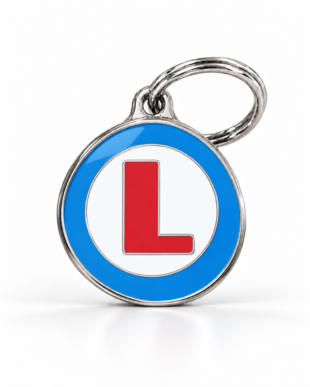 TAGiDOG letter L dog ID tag, round front view on white