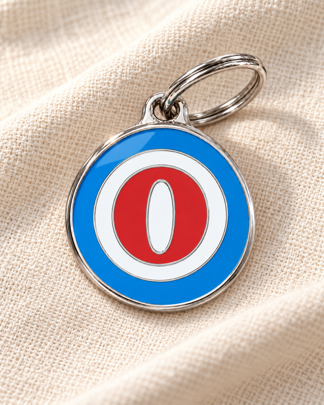 TAGiDOG letter O dog ID tag on light linen