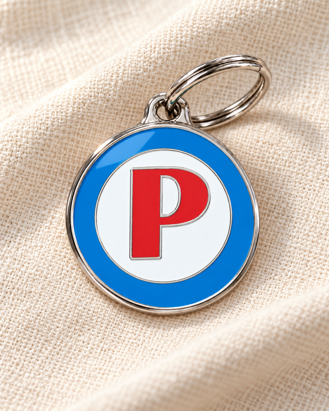 TAGiDOG letter P dog ID tag on light linen
