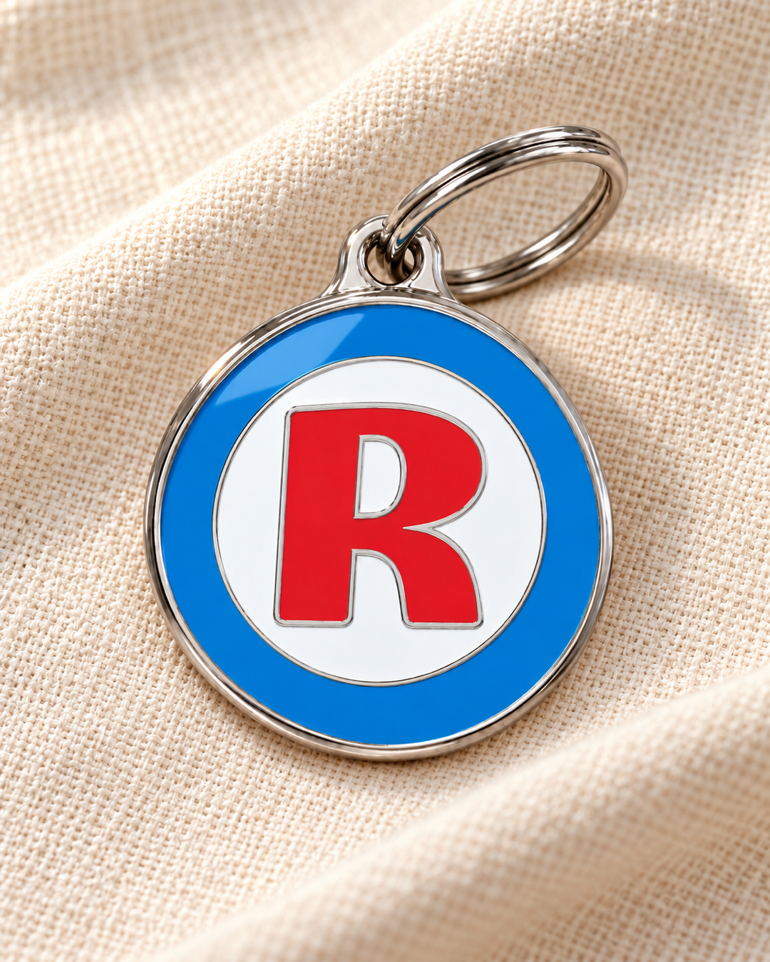 TAGiDOG letter R dog ID tag on light linen