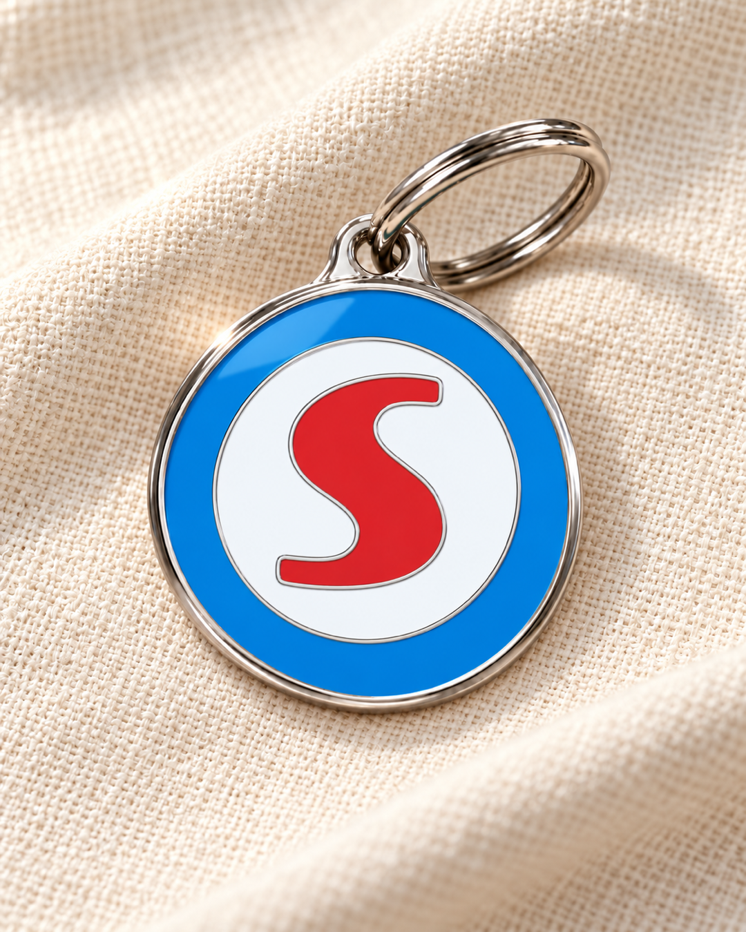 TAGiDOG letter S dog ID tag on light linen