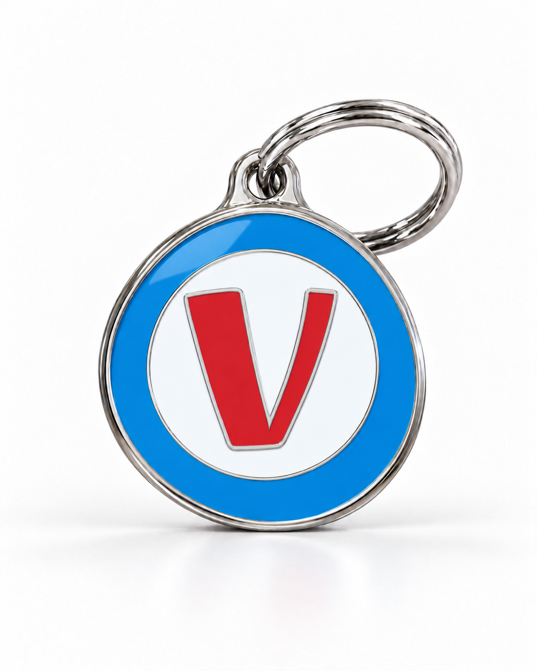 TAGiDOG letter V dog ID tag, round front view on white