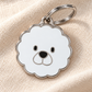 TAGiDOG Bichon Frise Dog ID Tag on light linen