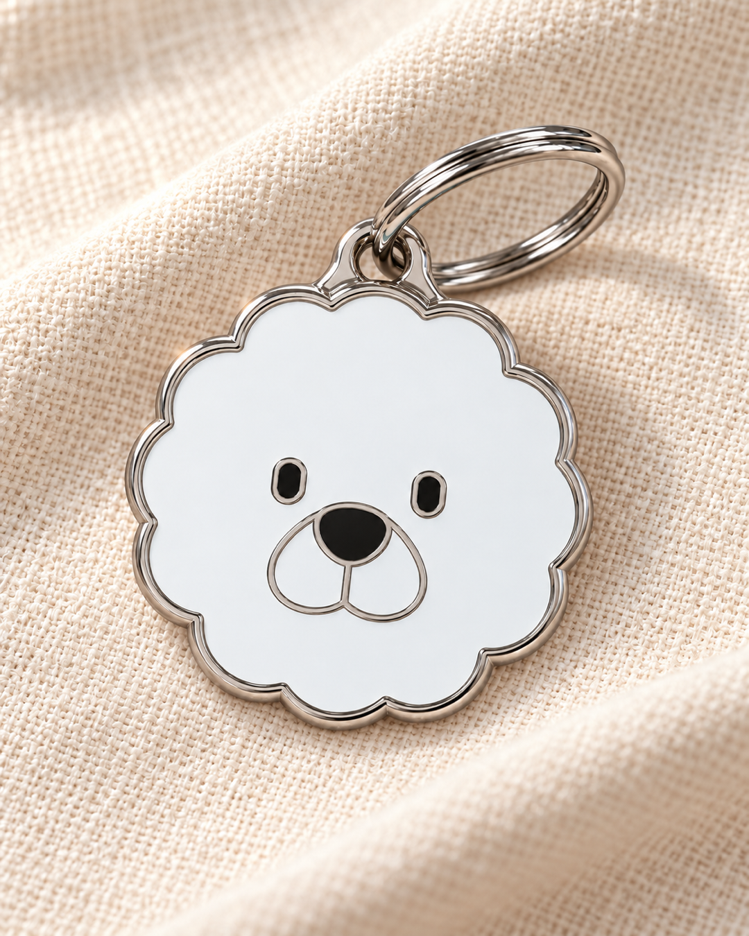 TAGiDOG Bichon Frise Dog ID Tag on light linen