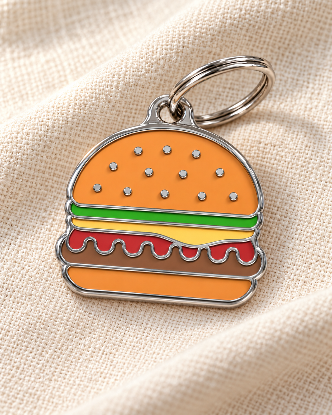 TAGiDOG Burger ID Tag dog ID tag on light linen