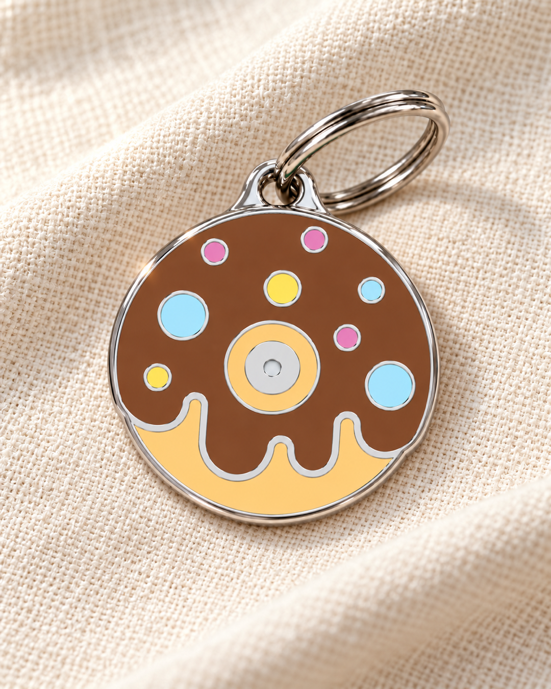 TAGiDOG Chocolate Donut ID Tag dog ID tag on light linen