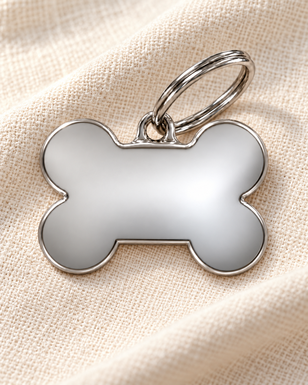 TAGiDOG Classic Bone ID Tag dog ID tag on light linen