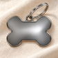 TAGiDOG Classic Fume Bone ID Tag Medium on light linen