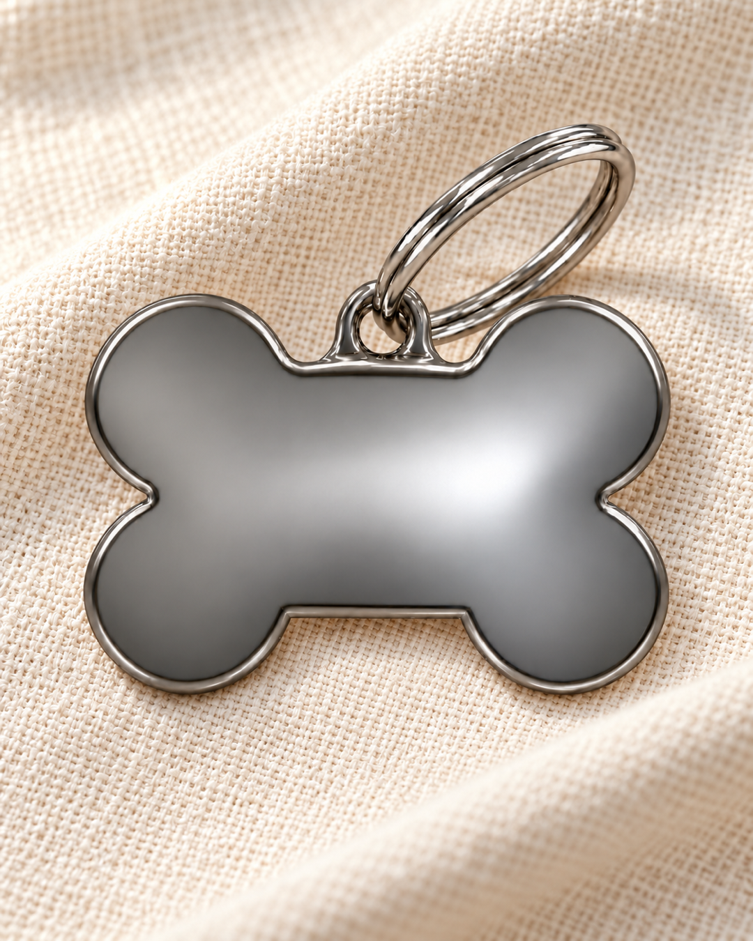 TAGiDOG Classic Fume Bone ID Tag Medium on light linen
