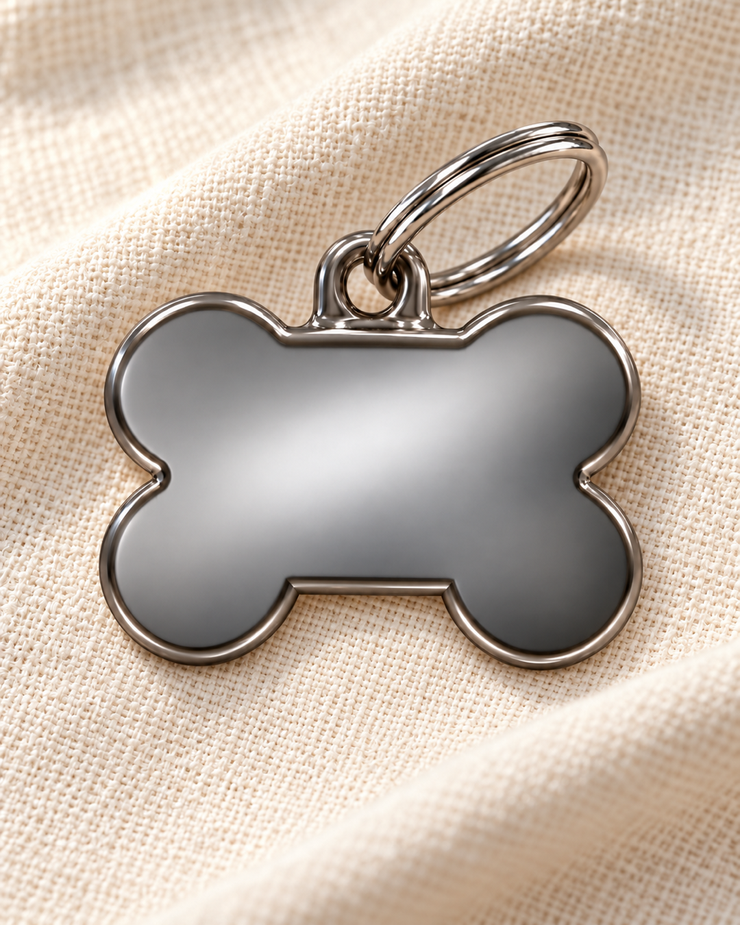TAGiDOG Classic Fume Bone ID Tag Small on light linen