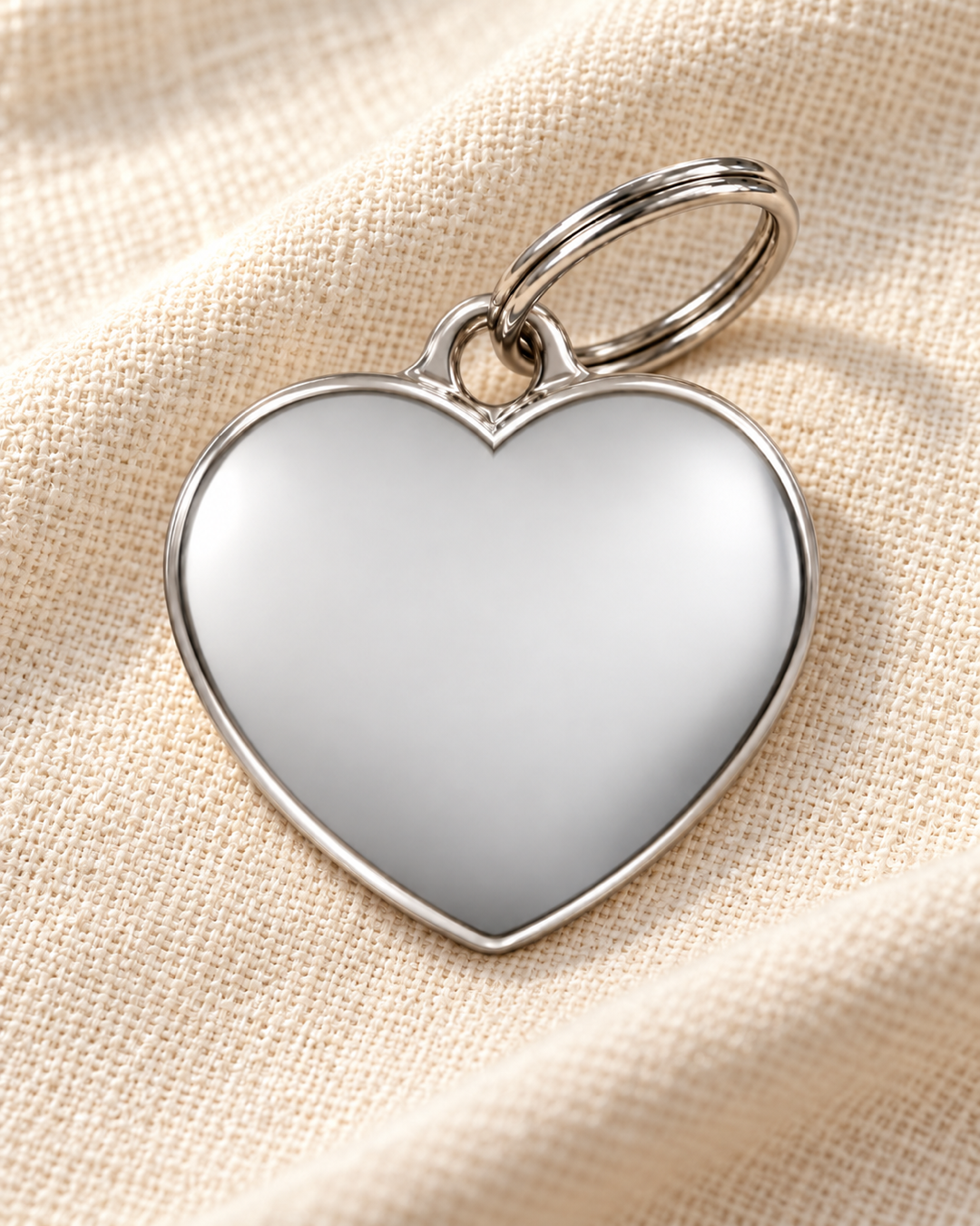 TAGiDOG Classic Heart ID Tag dog ID tag on light linen