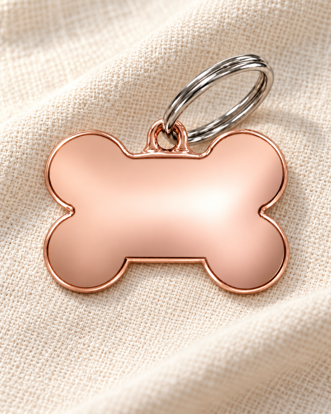TAGiDOG Classic Rose Bone ID Tag Medium on light linen