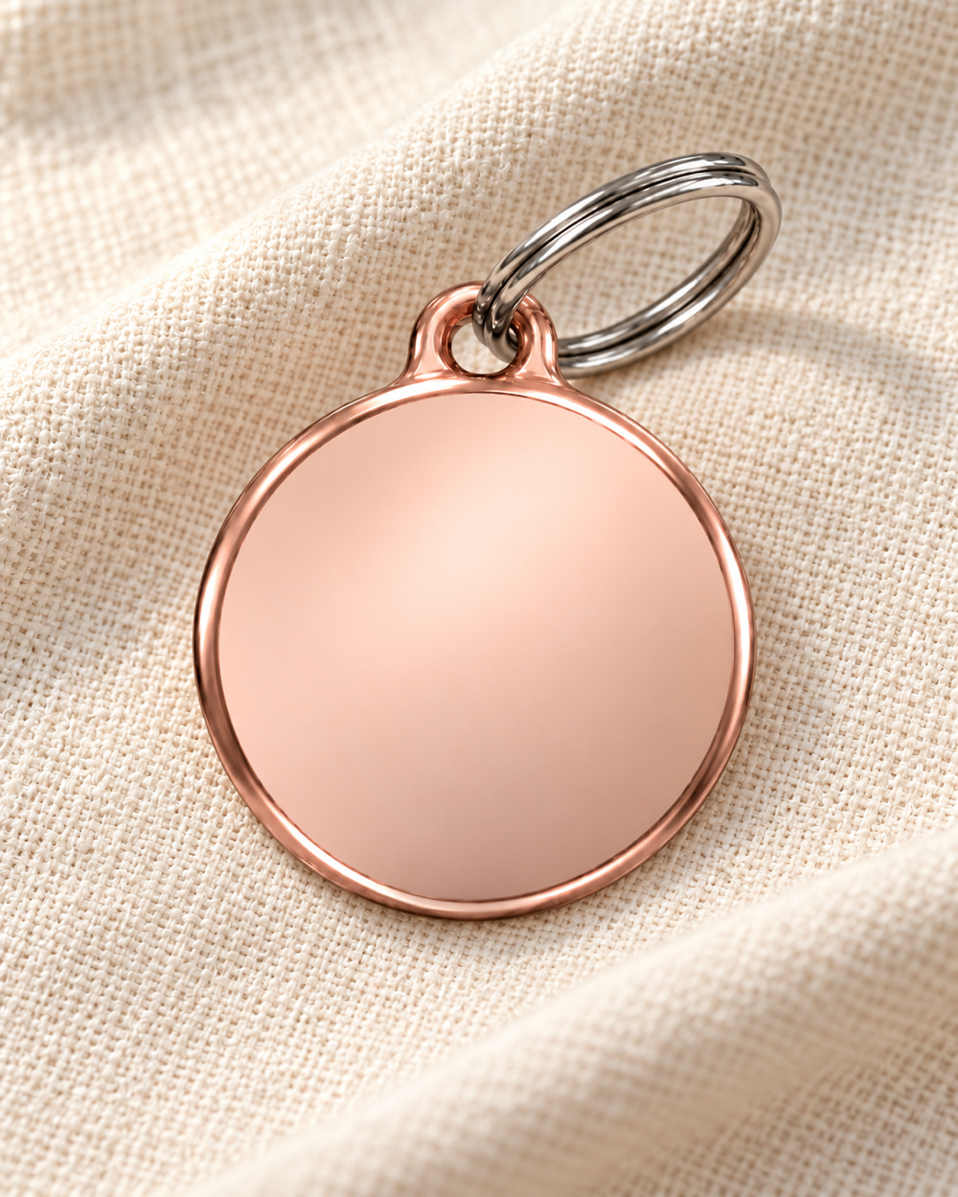 TAGiDOG Classic Rose Round ID Tag on light linen