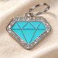 TAGiDOG Diamond Spark Blue ID Tag on light linen
