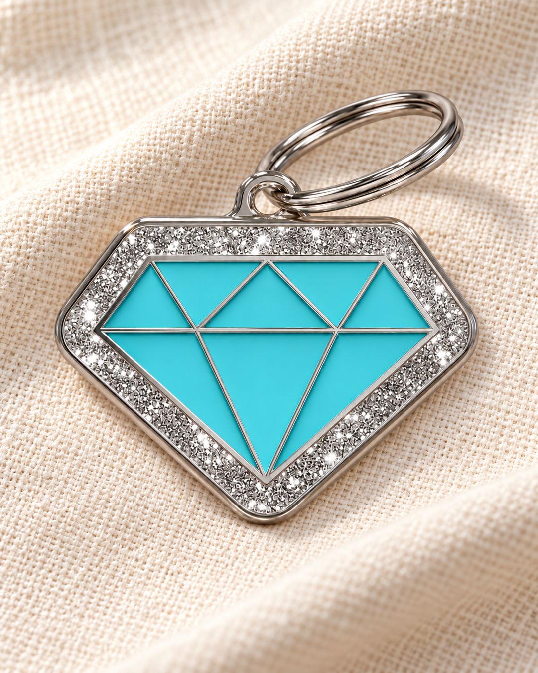 TAGiDOG Diamond Spark Blue ID Tag on light linen