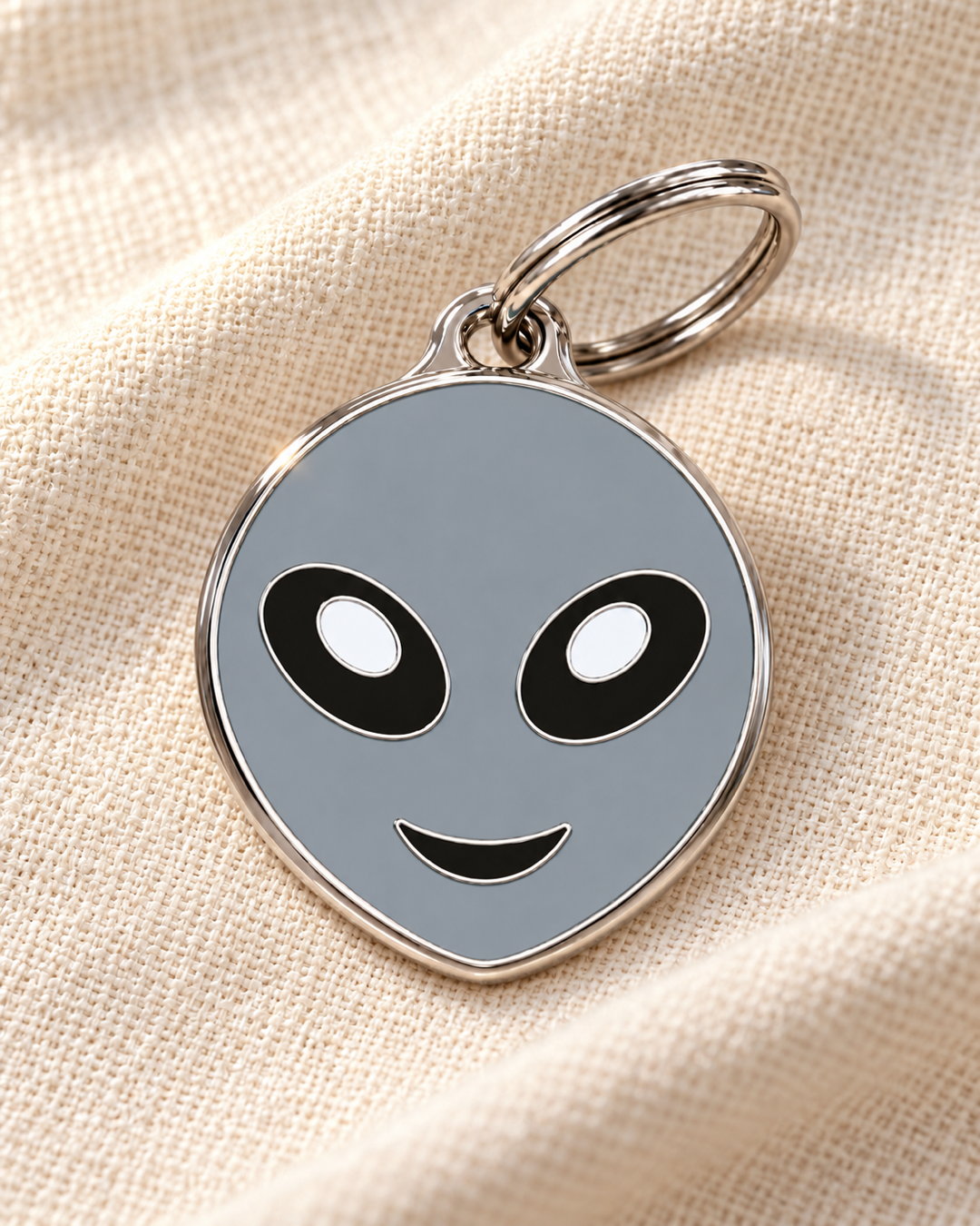 TAGiDOG Emoji Cosmo Pup dog ID tag on light linen