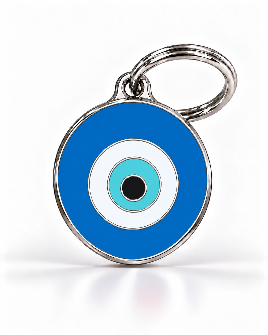 TAGiDOG Emoji Evil Eye dog ID tag, front view on white
