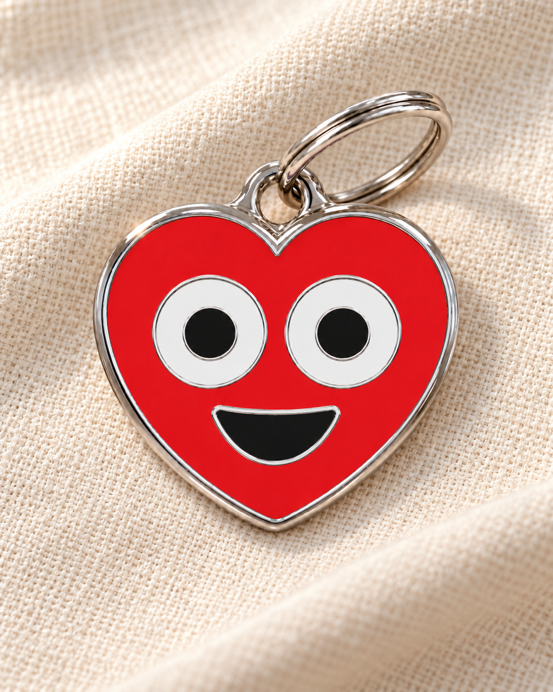 TAGiDOG Emoji Love Bug dog ID tag on light linen