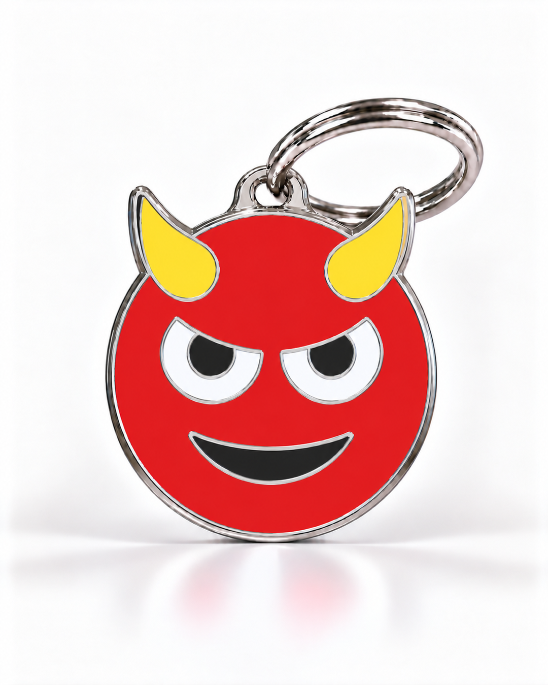 TAGiDOG Emoji Mischief dog ID tag, front view on white