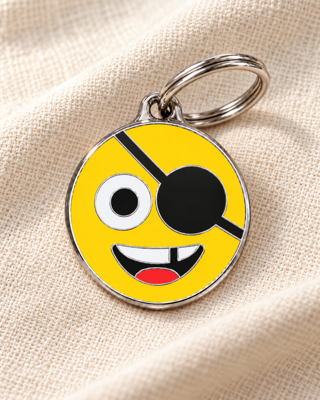 TAGiDOG Emoji Pirate dog ID tag on light linen