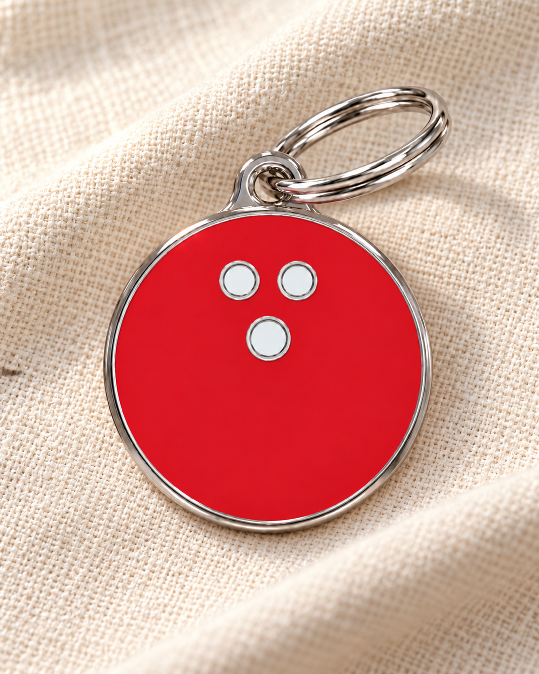 TAGiDOG Fire Strike Bowling ID Tag dog ID tag on light linen