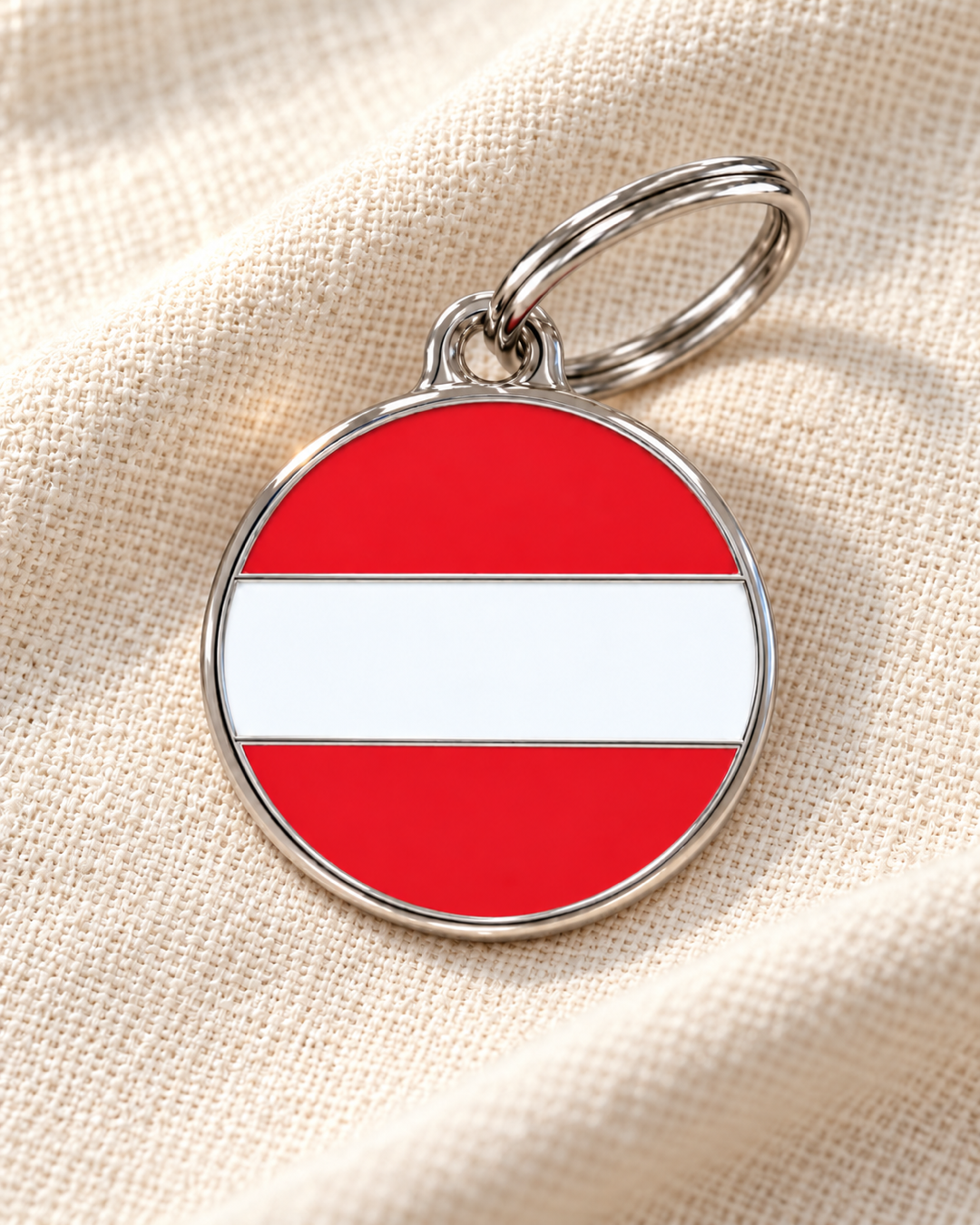 TAGiDOG Flag Austria ID Tag Medium dog ID tag on light linen