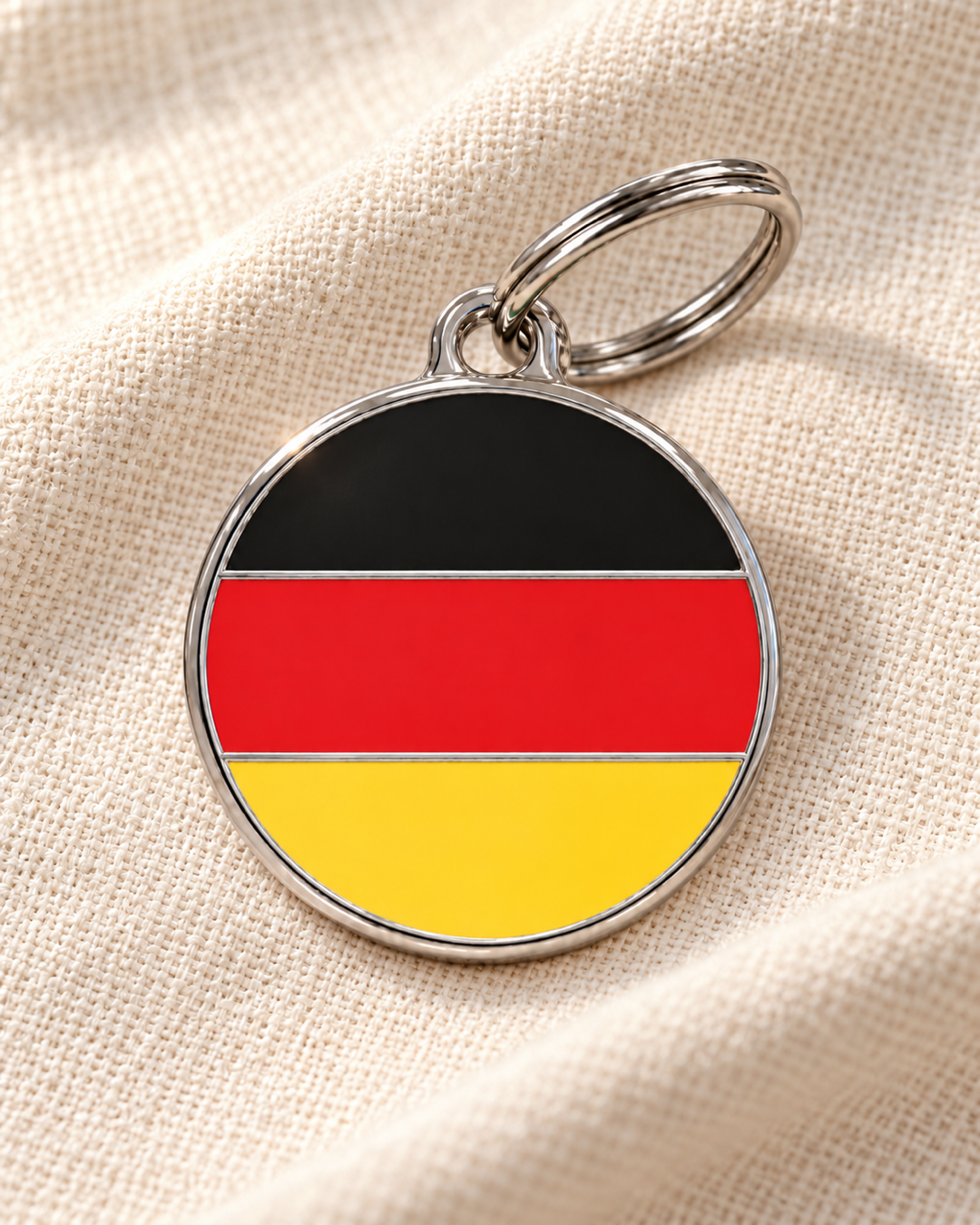 TAGiDOG Flag Germany ID Tag Medium dog ID tag on light linen