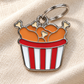 TAGiDOG Fried Chicken ID Tag dog ID tag on light linen
