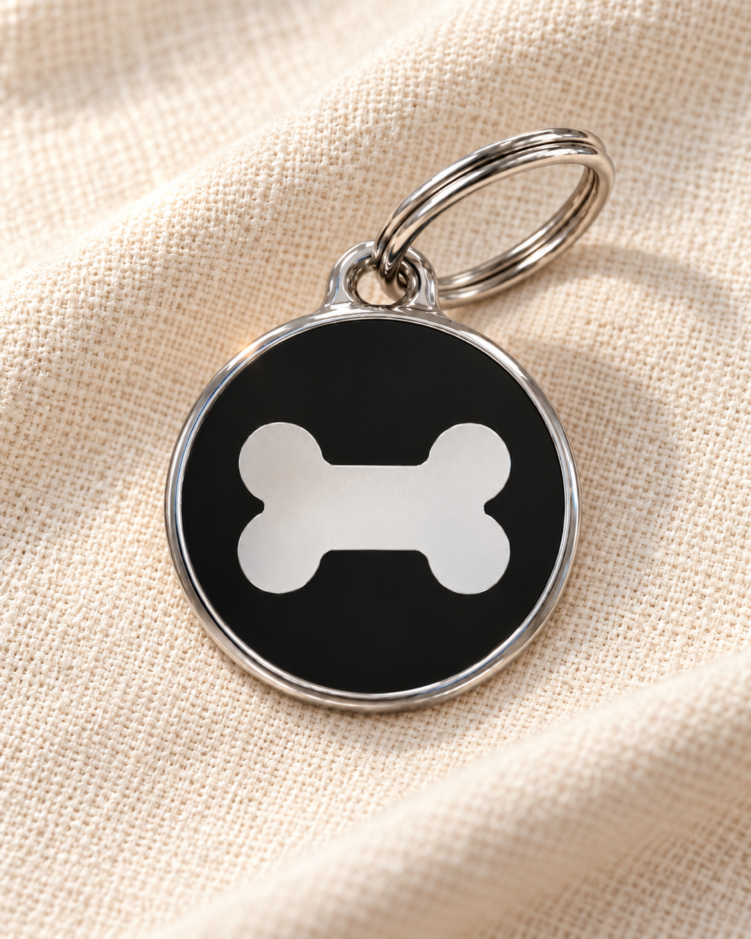 TAGiDOG Icon Bone Black ID Tag Medium on light linen