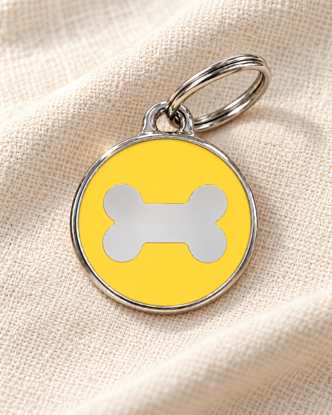 TAGiDOG Icon Bone Butter ID Tag Medium dog ID tag on light linen