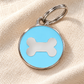 TAGiDOG Icon Bone Ice ID Tag Medium dog ID tag on light linen