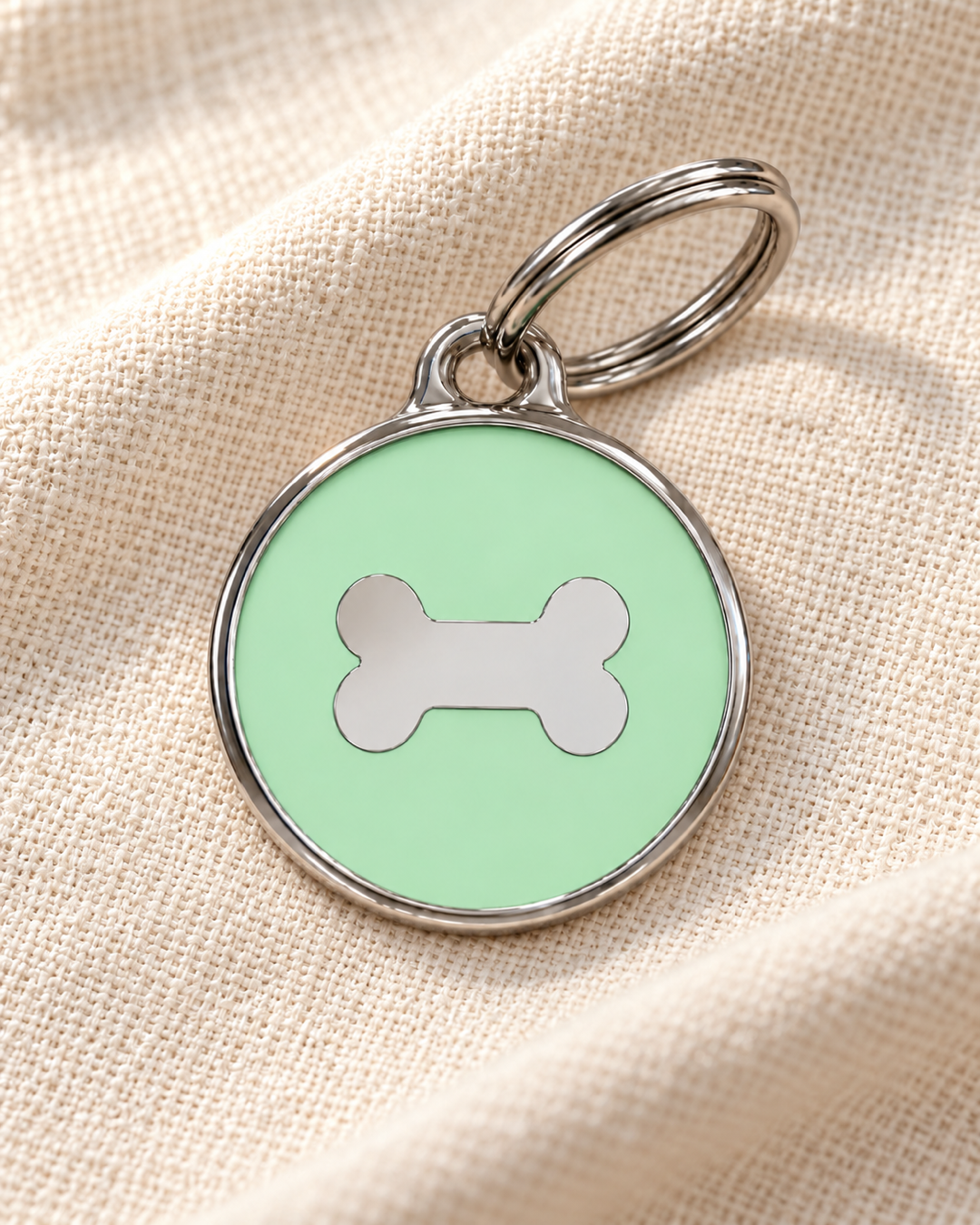 TAGiDOG Icon Bone Pistachio ID Tag dog ID tag on light linen