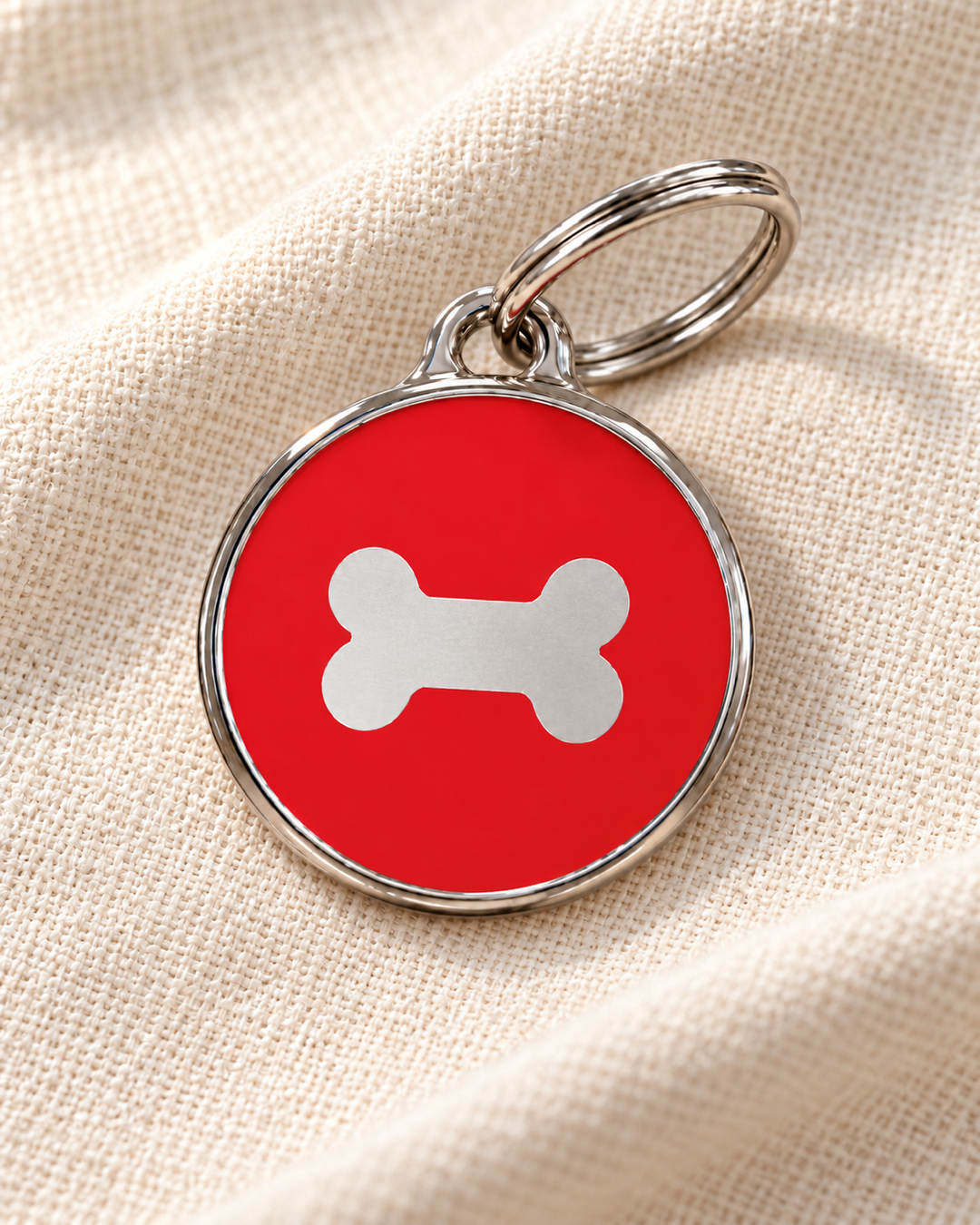 TAGiDOG Icon Bone Red ID Tag Small on light linen