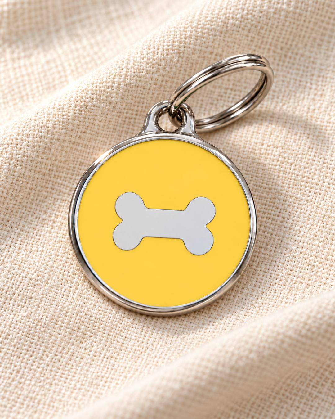 TAGiDOG Icon Bone Yellow ID Tag Small on light linen