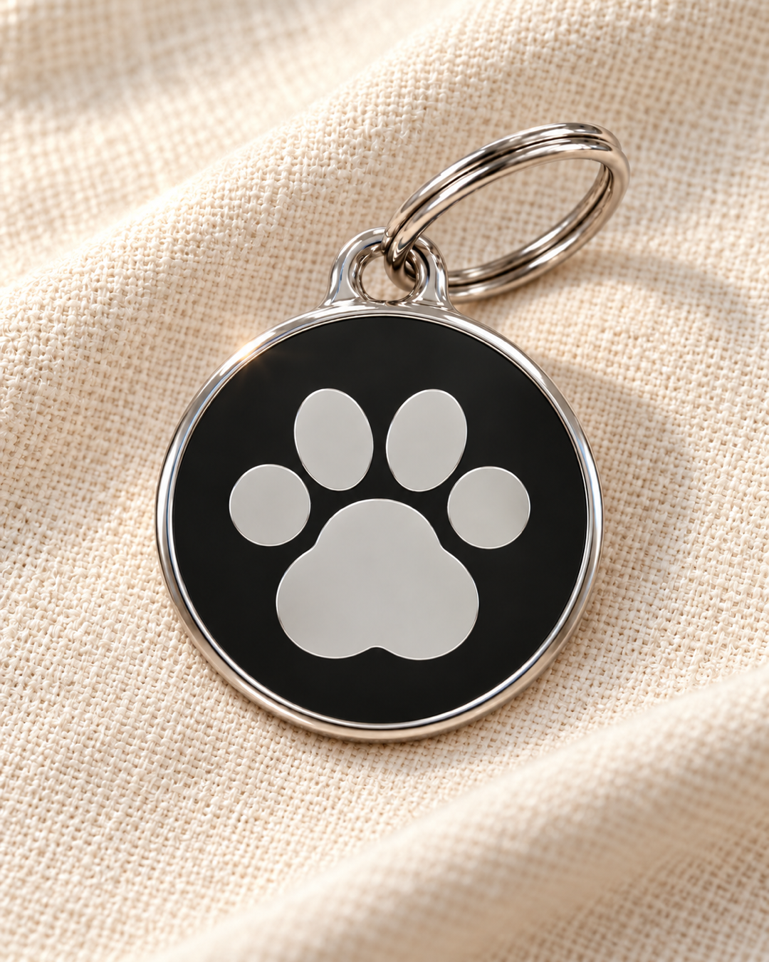 TAGiDOG Icon Paw Black ID Tag on light linen