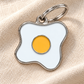 TAGiDOG Morning Bulls Eye ID Tag dog ID tag on light linen