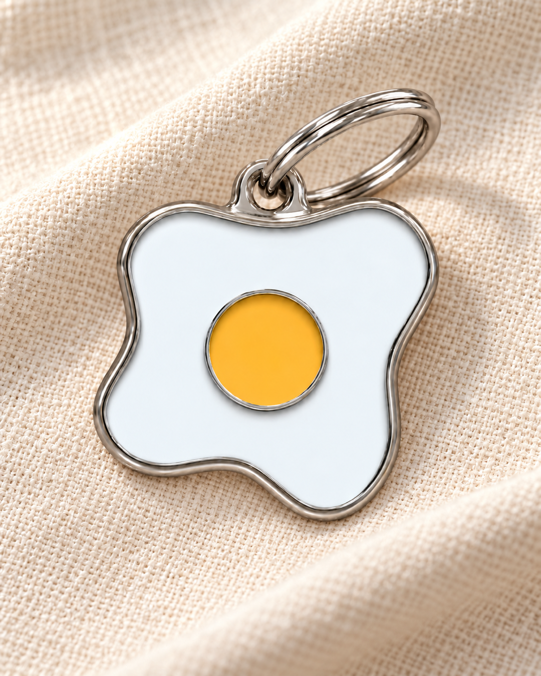 TAGiDOG Morning Bulls Eye ID Tag dog ID tag on light linen