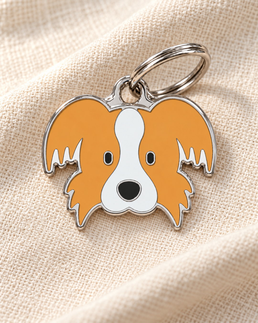TAGiDOG Papillon Dog ID Tag on light linen