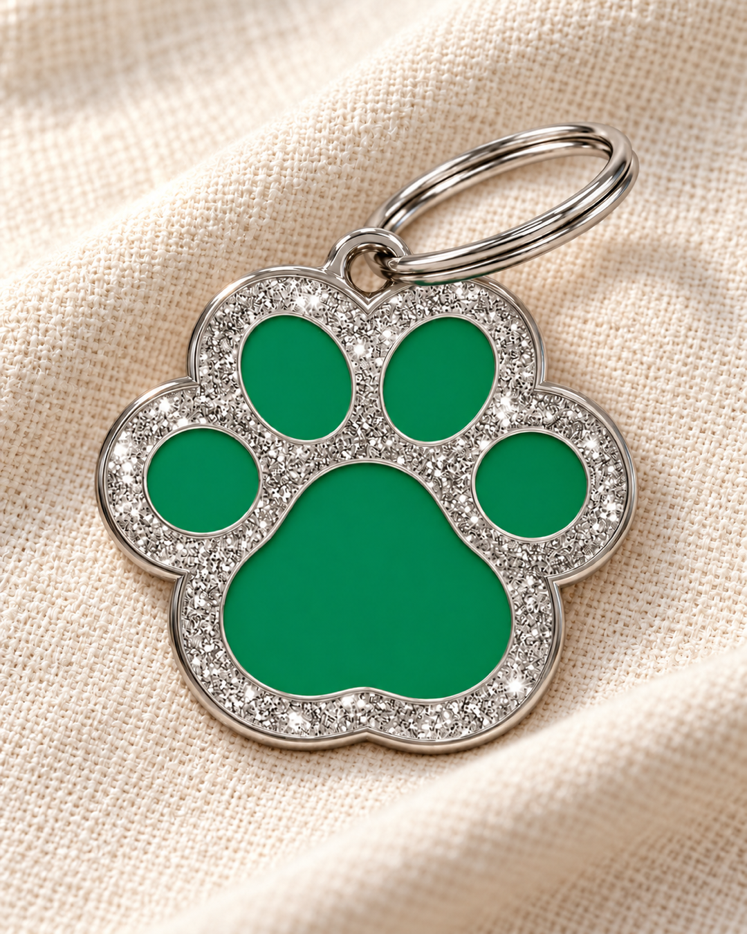 TAGiDOG Paw Spark Green ID Tag on light linen