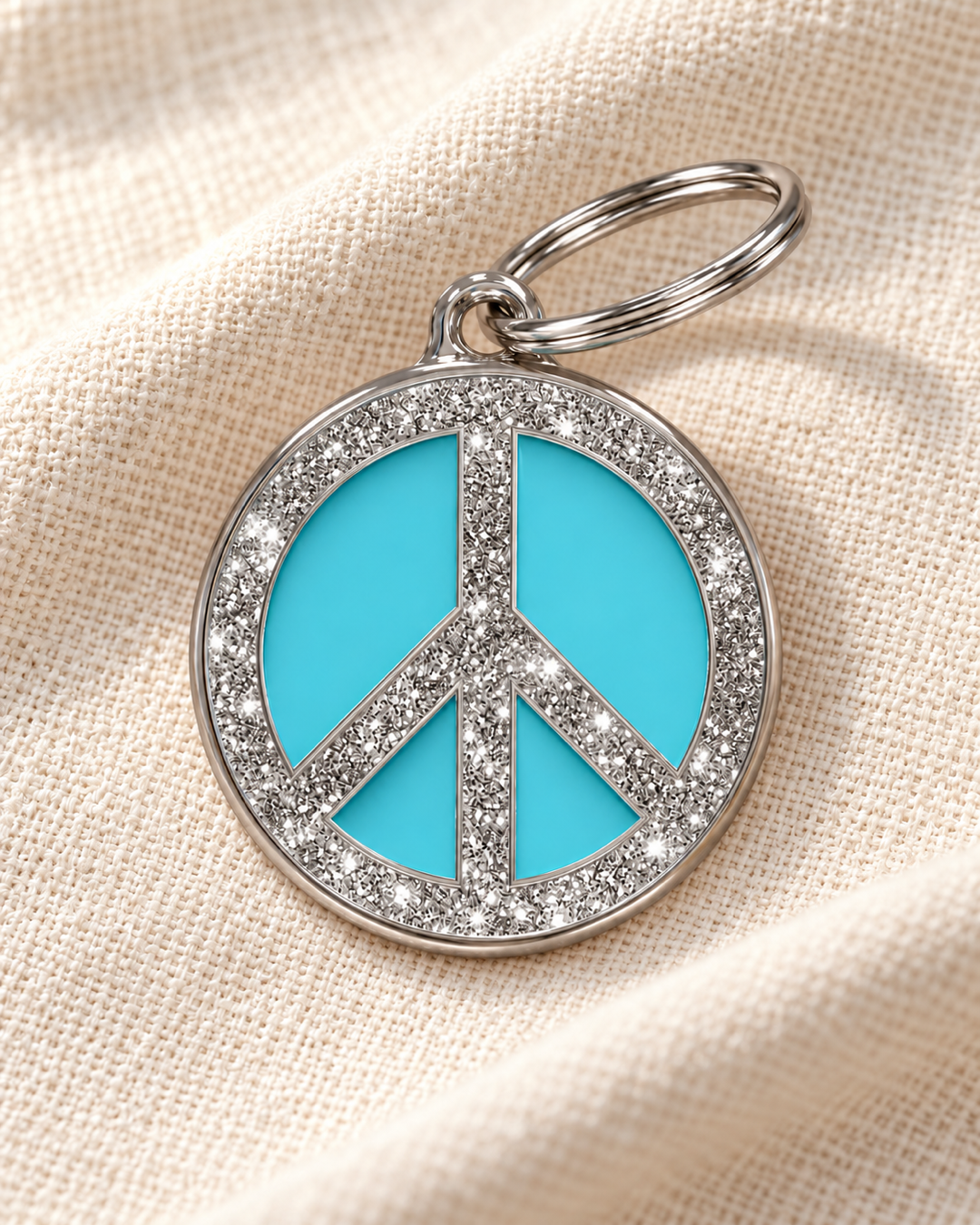 TAGiDOG Peace Spark Blue ID Tag on light linen