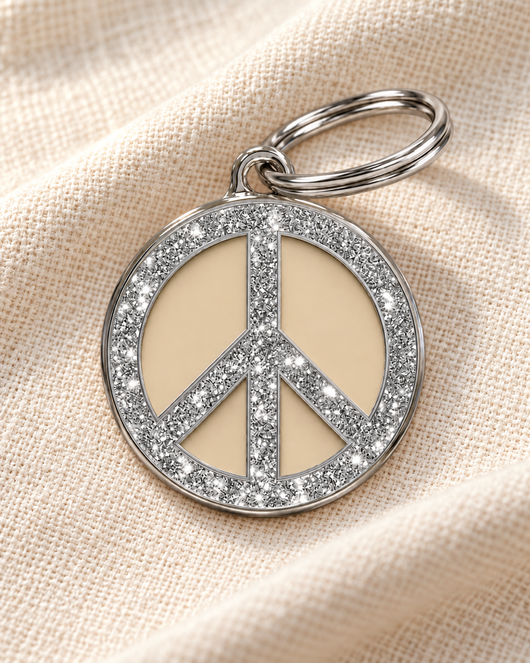 TAGiDOG Peace Spark Cream ID Tag dog ID tag on light linen