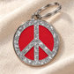 TAGiDOG Peace Spark Red ID Tag dog ID tag on light linen