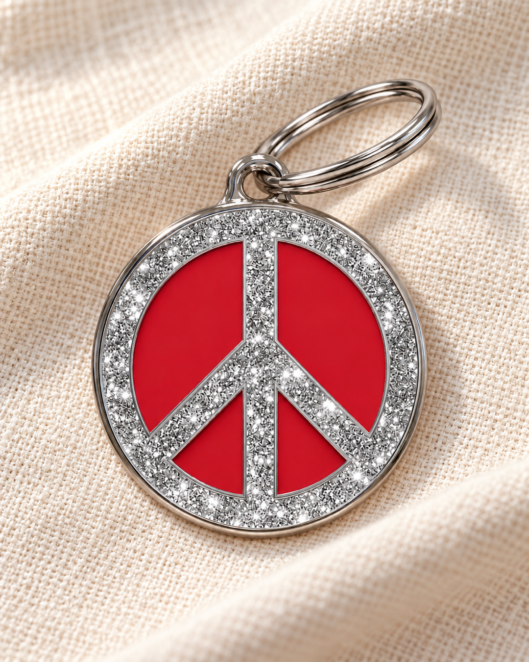 TAGiDOG Peace Spark Red ID Tag dog ID tag on light linen