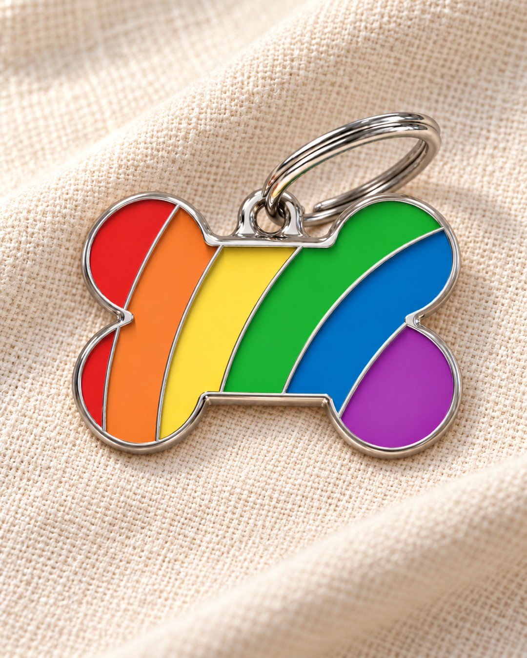 TAGiDOG Pride Bone Rainbow ID Tag Medium dog ID tag on light linen